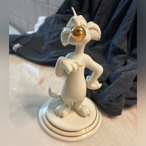 Sylvester figurine -ivory fine china accented with 24 karat gold.